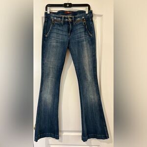 Low rise, medium wash, slightly worn, boot cut jeans